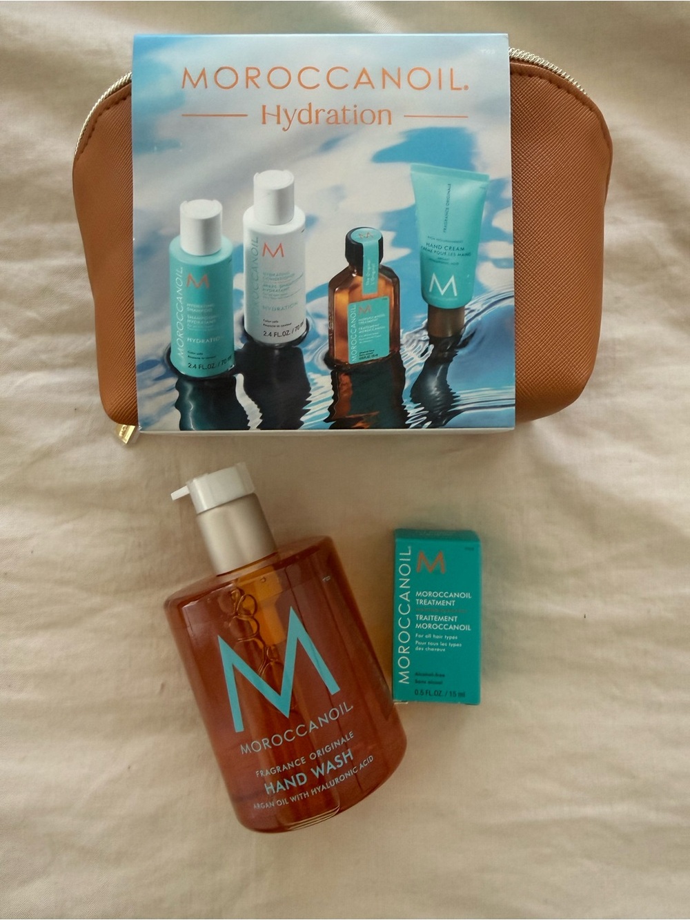 Moroccanoil Hydration Tan Pouch Set with liquid hand with soap and bonus oil